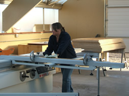 Photo of Betsy working in the shop.